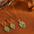 Elegant gold leaf jewelry set with green oval gemstones and sparkling crystal accents - Gold Green Stone Leaf Jewelry Set