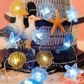 Marine theme LED string lights with seahorse and starfish charms on a blue fishing net - 4 Styles Mixed / 1m 10-LED 2AA Battery Box (Steady On)