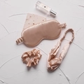 Three-piece champagne faux silk sleep set featuring eye mask, headband, and scrunchie - Champagne
