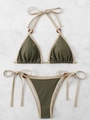 Flat lay of olive green string bikini with tortoise rings and cream trim detail - S / Olive Green