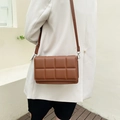 Chic brown quilted crossbody bag with adjustable leather strap and textured square pattern - Dark Brown