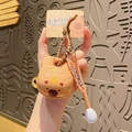 Capybara themed AirPods Pro case with retractable lanyard and acrylic charm accessory - Capybara Wooden Fish Keychain - Pear