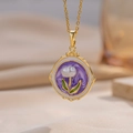 Vintage gouden ketting met paarse emaille bloemenhanger en witte bloemdetails - Paars (A8)