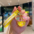 Cute yellow liquid sand keychain featuring a Mickey-shaped ring with colorful glitter beads - Mickey Head Shaker - Yellow