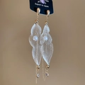Detail of elegant gold tassel earrings with lace leaves and white pearls on a display card - Silver Pin - Gold Silver Waterdrop Style