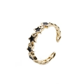 Verstellbarer goldener Sternring mit schwarzen Sterneinlagen im minimalistischen Stil - Einstellbar Offen / Schwarz