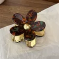 Elegant tortoise shell flower hair claw with gold metal grip in vintage colors - Blue Brown