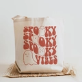 Cream canvas tote bag with Spooky Vibes ghost print for Halloween party accessories - Spooky Vibes Red Text Ghosts