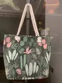 Casual green canvas tote bag with tropical leaf print and white thick rope handles - The Wizard of Oz Green