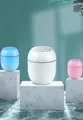 Mini humidificador USB con forma de huevo, luz nocturna colorida y ventilador multifunción - Rosa