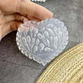 Translucent heart silicone mold featuring relief tulip flower patterns for DIY nail art - #016 Tulip Flower Heart Mold