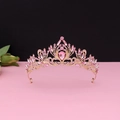 Detailed view of the luxury baroque gold crown with intricate pink rhinestones - No.2 KC Gold (Pink Stone)
