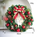 Close-up of Christmas wreath showing red ornaments, pine cones and wooden reindeer - 45CM Deer Wreath