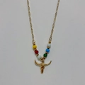 Detailed close-up of golden paperclip chain necklace with colorful beads and bull skull pendant - Bull Skull - Colorful Stone