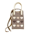Detailed knit texture of mini phone bag featuring colorful heart patterns and cream strap - Heart Coffee