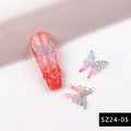 Detailed macro view of 3D aurora resin butterfly nail charms with gold glitter - SZ24-05/Transparent Gold Foil