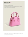 Détail du sac Boston en simili cuir rose avec doubles anses et boucles en métal argent - Rose