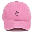 Detailed close-up of pink washed cotton baseball cap featuring palm gesture embroidery - Adjustable / Pink