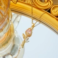 Close-up of pink crystal tulip flower pendant in titanium steel with gold chain - Gold-Pink