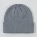Detailed view of the soft knitted texture and cuffed edge of the grey baby beanie - Light Gray