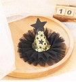 Close-up of Halloween mini wizard hat clip with gold sequins and black mesh details - Mesh Star Black Lace Hat