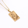 Vintage golden Strength Tarot card pendant necklace with detailed lion engraving - Strength