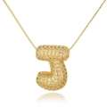 Macro shot of gold bubble letter J pendant necklace with iced-out cubic zirconia stones - Letter J (D1079-J)