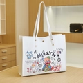 White faux leather tote bag with colorful cartoon graffiti and artistic illustrations - Graffiti