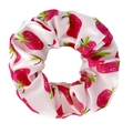 Close-up of white fabric scrunchie with pink strawberry print and glossy finish - Strawberry White