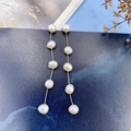 Detail of elegant S925 silver long tassel earrings with natural white baroque pearls - Stud-5 Pearls / Gold