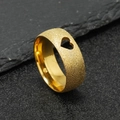 Detailed macro view of matte gold stainless steel ring with hollow heart-shaped cutout - Gold Color Hollow Heart (8mm)