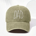 Detail of white DAD embroidery on a washed olive green cotton canvas baseball cap - Khaki