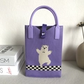 Purple knitted tote bag with polar bear pattern and checkered base, stylish handmade bag - Dancing Bear Purple Background
