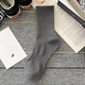 Dark grey crew socks with vertical ribbed knit texture for breathable athletic comfort - One Size / Dark Gray