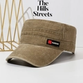 Washed khaki flat top military cap with a black Fashion label in a modern setting - Khaki