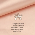 Silver stainless steel bow pendant with detailed dimensions on a pink satin background - Steel Bow 1 Pendant