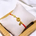 Minimalist red cord lucky bracelet with gold coin charms and engraved Chinese characters - Gold Zhao Cai Jin Bao Red Cord Style (5338)