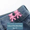 Pink mini bear button pin for jeans waist adjustment on blue denim fabric - Hand-sewn Bear / Sakura Pink