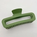 Close-up of green matte square claw clip showing hollow rectangular design and inner teeth - Large (13CM) / Green