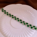 Elegant double-layered silver bangle with green zircon stones and sparkling crystals - Silver Green Gemstone Luxury Bracelet