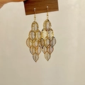 Boucles d'oreilles pendantes en feuilles dorées évidées à plusieurs niveaux - Feuilles Filigranes Multicouches Dorées