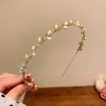 Golden headband featuring white pearl flowers and rhinestones for an elegant look - Gold Flower