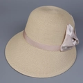 Stro zonneklep voor dames met roze strik voor zomerse zonbescherming en vakantie - M (56-58cm) / Beige
