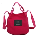 Secchiello minimalista in tela fucsia con toppa logo e tracolla regolabile - Rosso