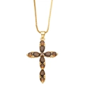 Detail shot of golden cross pendant featuring brown pear-shaped zircon gemstones - Brown