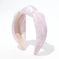 Detail shot of the soft velvet texture and knot design on the pink padded headband - Velvet Knotted Style / White