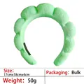 Detail view showing green puffy spa headband dimensions 17x18x4cm and soft wavy design - 15-light Green Terry Cloth Headband