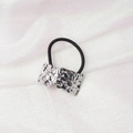 Detail shot of silver textured irregular metal plate on black elastic hair tie - Irregular Wrinkled (3) / Silver