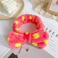 Pink plush headband with yellow polka dots and bow detail for skincare and makeup - Bright Pink Yellow Polka Dot