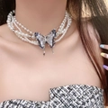 Three-layer pearl necklace featuring a black and white butterfly pendant with silver metal - Three-Layer Artificial Pearl Butterfly Necklace (X4203A)